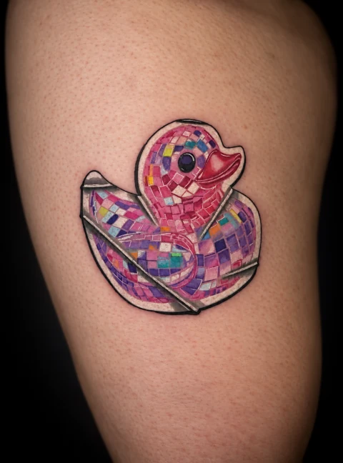Pink and purple mosaic rubber duck tattoo